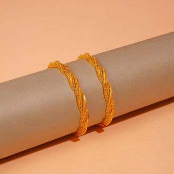 Dazzle This Season with Designer Gold Bangles – Naina Collection